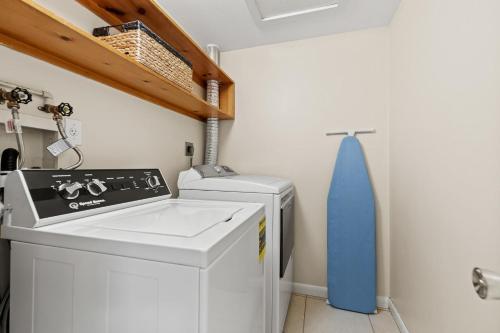 a laundry room with a washer and dryer at Summer Nights in Bailey Hall