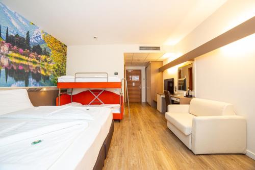 Una cama o camas en una habitación de Best Western Hotel Adige