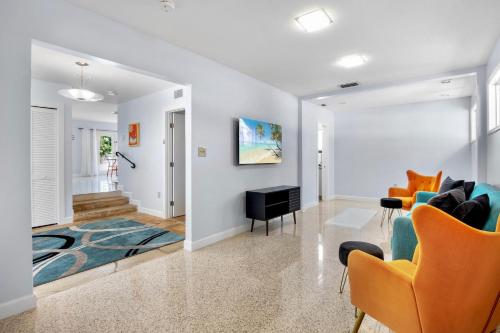 a living room with a couch and a table at Leona Breeze in Bailey Hall