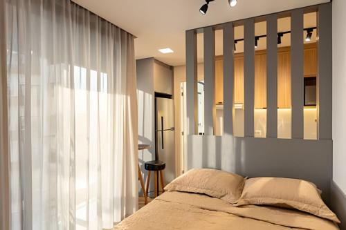 Postel nebo postele na pokoji v ubytování Alto & Estilo | Batel