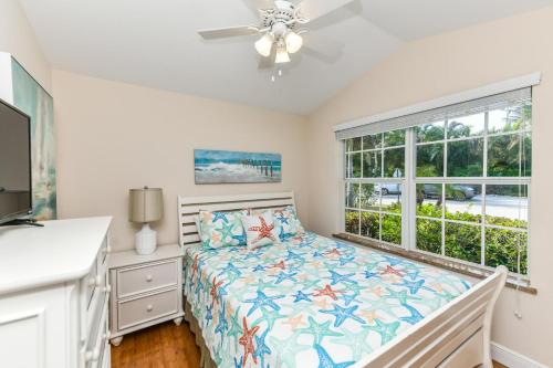 Postel nebo postele na pokoji v ubytování Ariel's Island