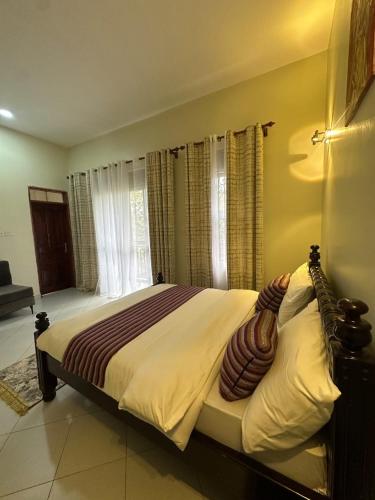 Postel nebo postele na pokoji v ubytování D&Y Homes