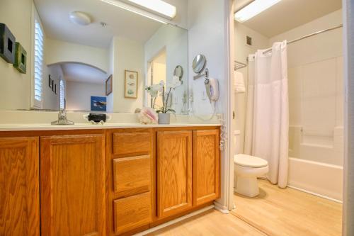 a bathroom with a sink and a toilet and a mirror at Pacific Plaza #204 - Eagles Nest - 1BdrmUp-K in Oceano
