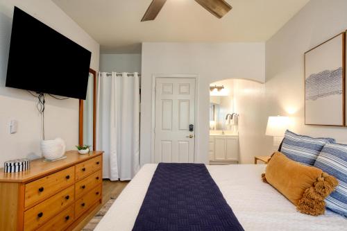 a bedroom with a bed with a tv on the wall at Pacific Plaza #511 - Oceano Escape - 1BdrmUp-K-QSofa in Oceano