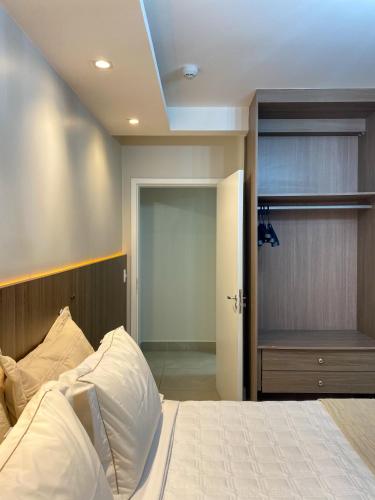 Ένα ή περισσότερα κρεβάτια σε δωμάτιο στο Concept Hotel Flat
