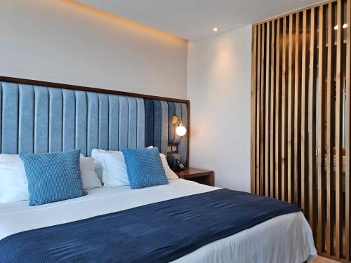 Postel nebo postele na pokoji v ubytování Hotel Perla Spondylus