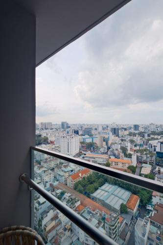 a view of a city from a balcony at Lancaster Legacy Executive Apartments in Ho Chi Minh City
