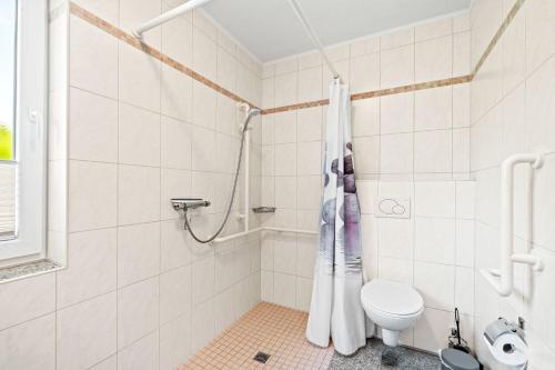 Ένα μπάνιο στο Ferienwohnung Ruteplate