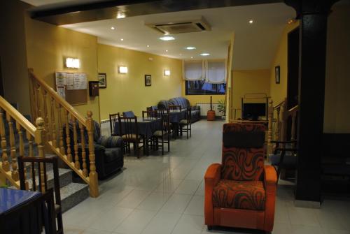 Χώρος καθιστικού στο Hotel Alegría