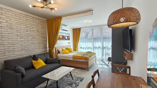 Et opholdsområde på Vivid Sea and City Luxury Studio 2 plus 2