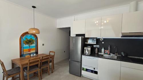 Køkken eller tekøkken på Vivid Sea and City Luxury Studio 2 plus 2