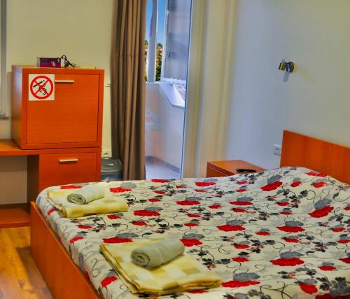 Llit o llits en una habitació de Welcome&Enjoy 4