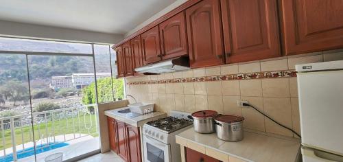 Kuchyň nebo kuchyňský kout v ubytování Bungalow Villa Pedrito