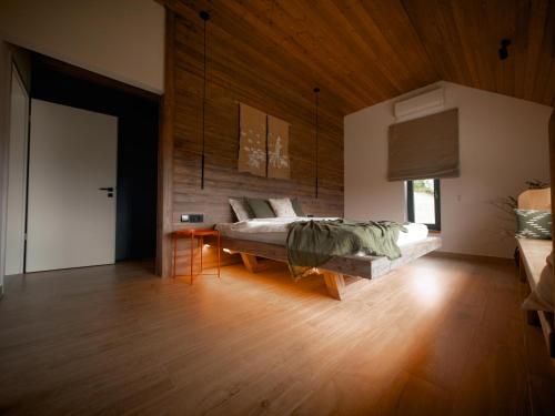 Postel nebo postele na pokoji v ubytování Aftăr Hills