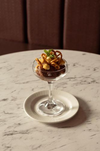a dessert in a glass bowl on a table at Portrush Atlantic Hotel in Portrush