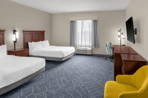 Postel nebo postele na pokoji v ubytování Hampton Inn and Suites Coconut Creek