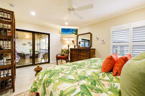 Ένα ή περισσότερα κρεβάτια σε δωμάτιο στο Coquina Beach 1H