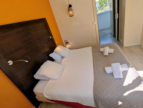 Postel nebo postele na pokoji v ubytování MOODz HOTEL VIENNE