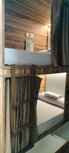 Ένα ή περισσότερα κρεβάτια σε δωμάτιο στο Marevita Hostel