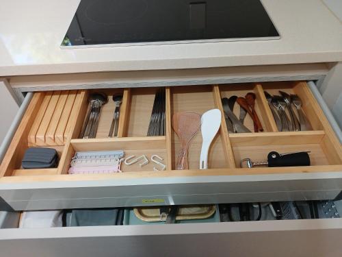 a drawer full of kitchen utensils in a cabinet at 스테이두모락 
