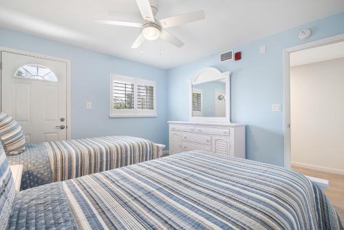 Ένα ή περισσότερα κρεβάτια σε δωμάτιο στο Breakers West A2