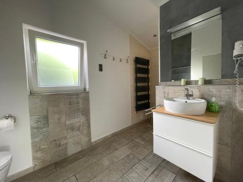Ένα μπάνιο στο Wacholderbusch - Lastering Ferienhäuser & Apartments