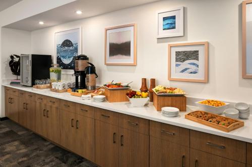 a kitchen with a counter with food on it at Element Minneapolis Downtown North Loop in Minneapolis