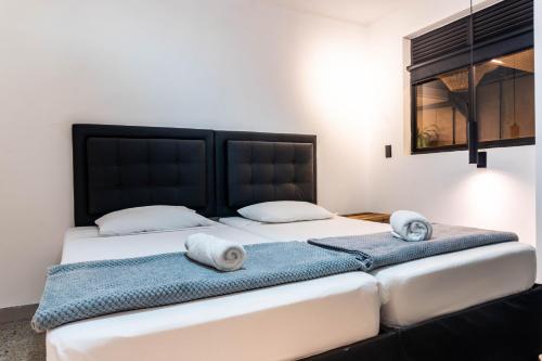 hotel civitas medellinにあるベッド