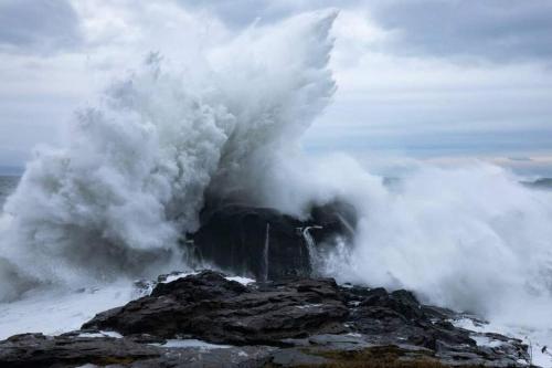 a erupting volcano with steam coming out of it at The Great Escape - Port Renfrew & Bunkhouse in Port Renfrew