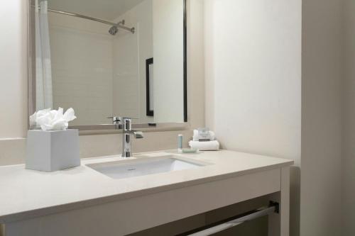 a bathroom with a sink and a mirror at Fairfield Inn & Suites by Marriott Chattanooga in Chattanooga