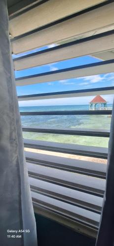 a view of the ocean from a train window at Casa Mariner Resort in Good Hope
