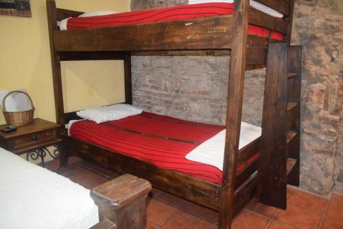 Ένα ή περισσότερα κρεβάτια σε δωμάτιο στο Hostal Antigüeño
