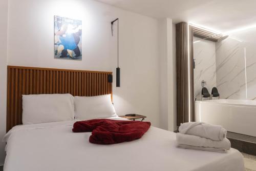 hotel civitas medellinにあるベッド