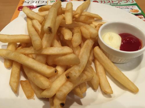 a plate of french fries with a bowl of ketchup at kinugawaonsen Fukumatsu in Nikko