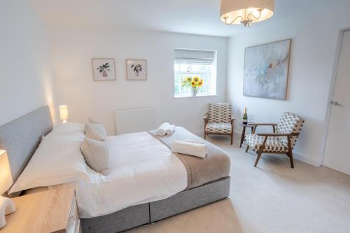 Postel nebo postele na pokoji v ubytování Lonsdale House Boutique Apartments