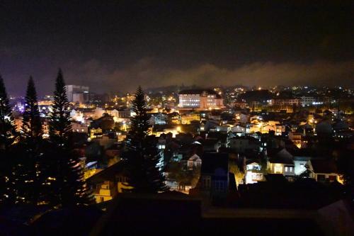 a view of a city at night at Vuon Hoa Hong (Rosary) in Da Lat