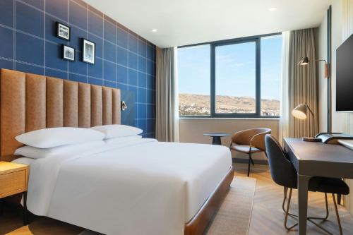 Ένα ή περισσότερα κρεβάτια σε δωμάτιο στο Four Points by Sheraton Elazig