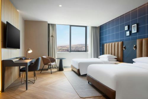 Postel nebo postele na pokoji v ubytování Four Points by Sheraton Elazig