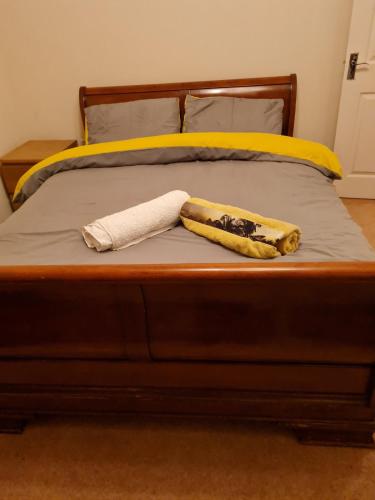 a banana sitting on top of a bed at Super king bed room A in Sherborne Saint John