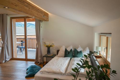 Postel nebo postele na pokoji v ubytování Mountain Vista - Bio Yoga Hof