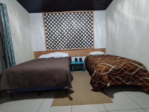 Llit o llits en una habitació de Mirador
