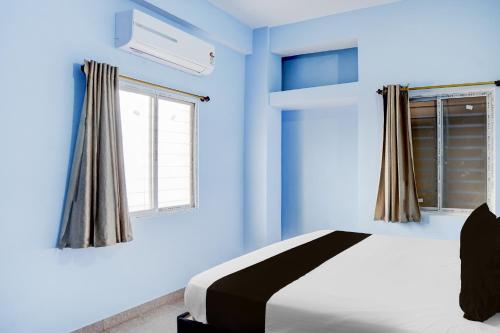 Katil atau katil-katil dalam bilik di Hotel O The Royal Inn