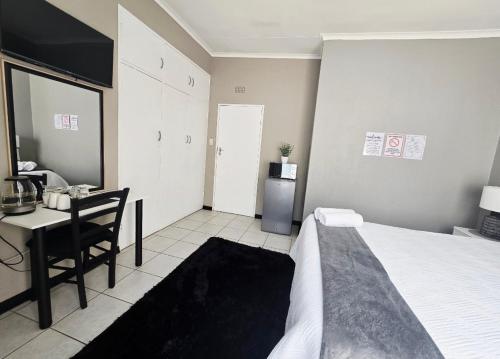 Postel nebo postele na pokoji v ubytování Zhantique Guest House 2- Unit 4