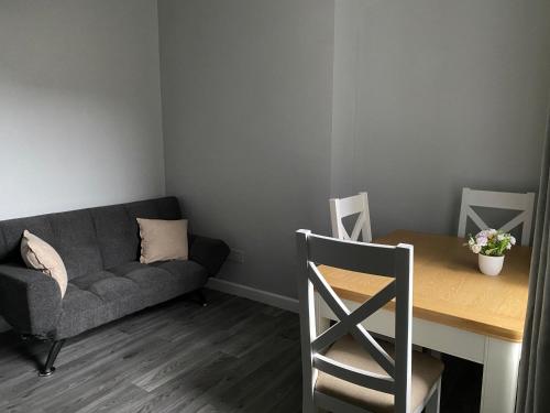 Posezení v ubytování Baron Apartament
