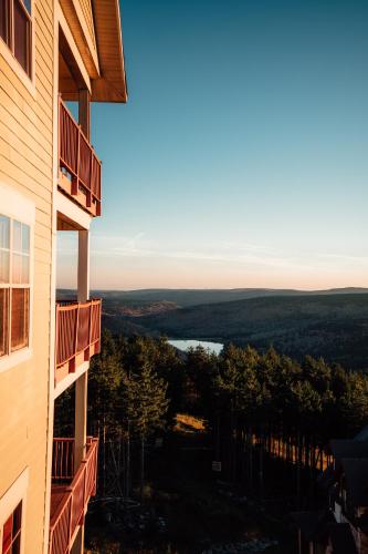 a view from the balcony of a building at Remodeled Ski In-Out - 305 Soaring Eagle - Luxury! in Dunmore