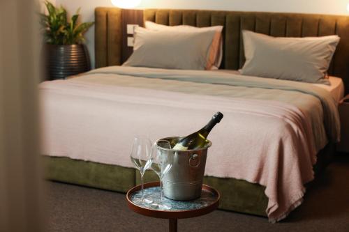 Postel nebo postele na pokoji v ubytování Padam Boutique Hotel