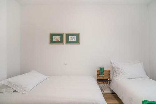 Katil atau katil-katil dalam bilik di Residenza JOY