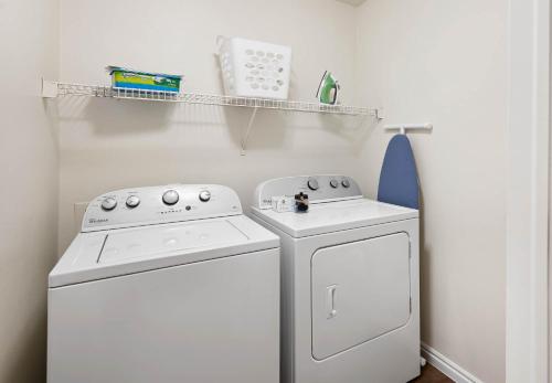 a kitchen with a white stove and a dishwasher at Relaxing Place Close to Skiing in Midvale