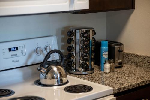 a tea kettle sitting on top of a stove at Relaxing Place Close to Skiing in Midvale