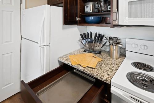 a small kitchen with a stove and a counter top at Relaxing Place Close to Skiing in Midvale